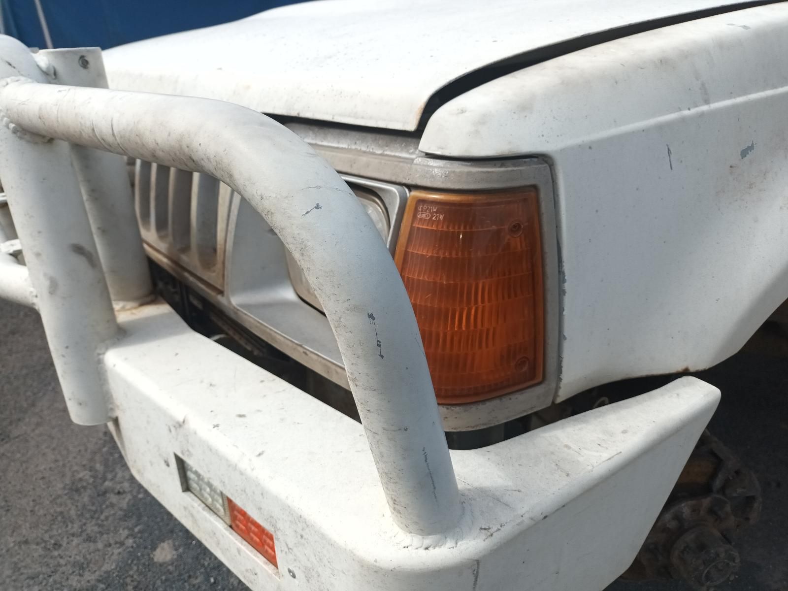 A Close Up of a White Car with a Bumper — South West 4WD Wreckers In Brisbane, QLD