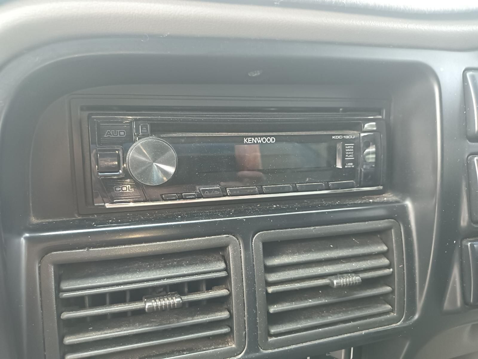 A Car Radio is Sitting on the Dashboard of a Car — South West 4WD Wreckers In Brisbane, QLD