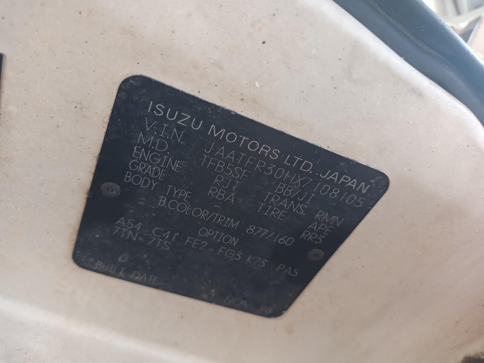 A Close Up of a Sticker on the Side of a Car That Says Isuzu Motors Ltd Japan — South West 4WD Wreckers In Brisbane, QLD