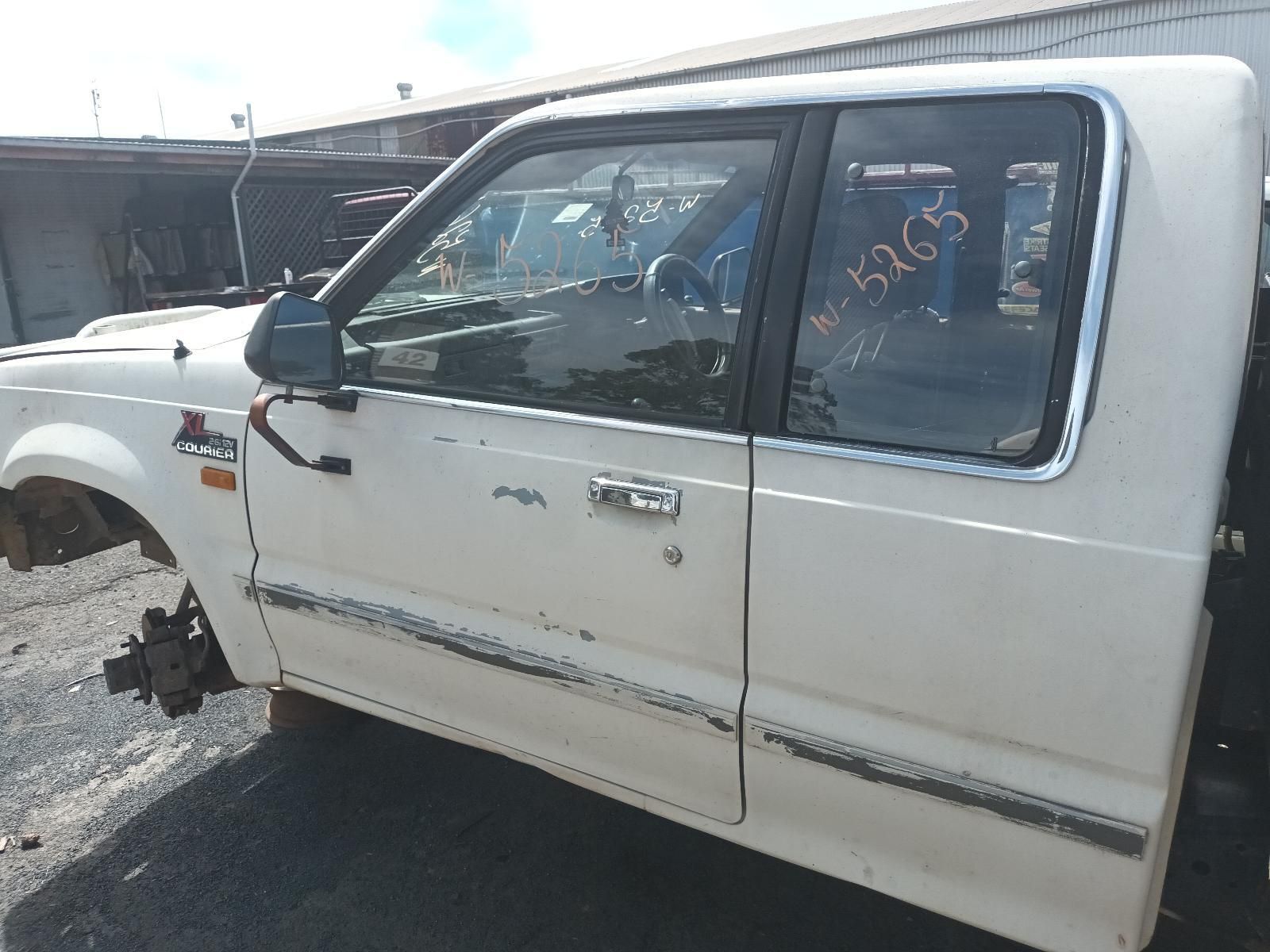 A White Truck with the Numbers on the Window — South West 4WD Wreckers In Brisbane, QLD
