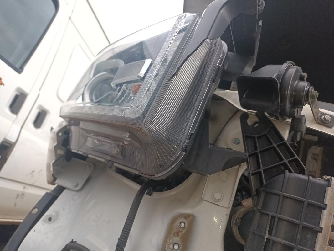 A Close Up of a Headlight on a White Car — South West 4WD Wreckers In Brisbane, QLD