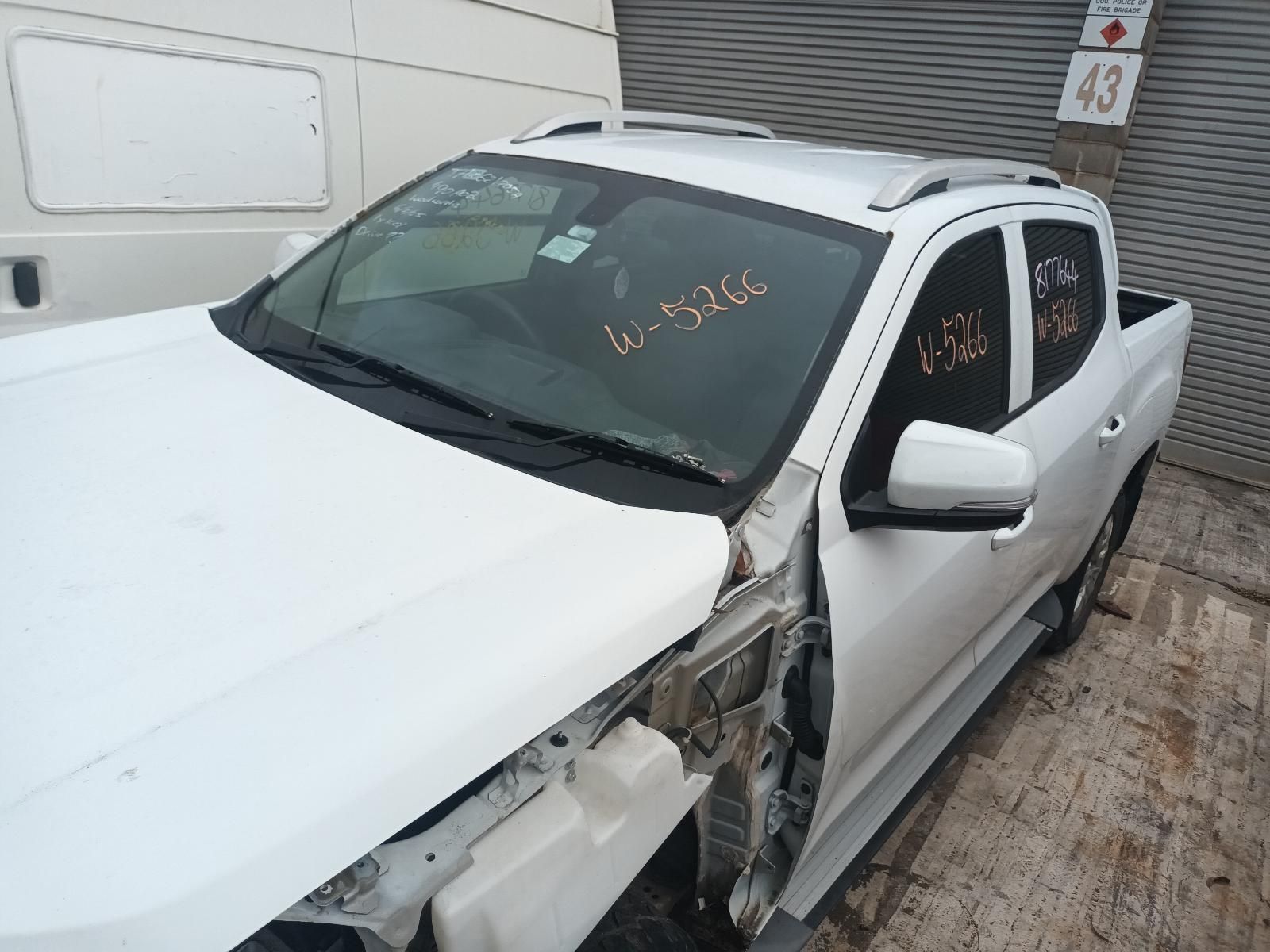 A White Truck With a Broken Windshield — South West 4WD Wreckers In Brisbane, QLD