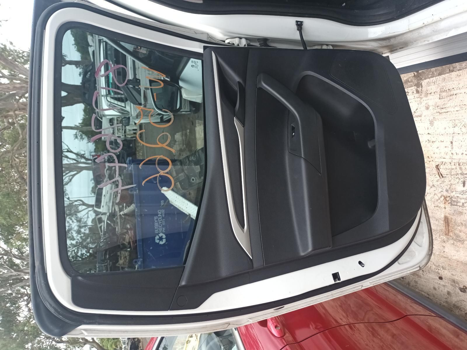 The Back Door of a White Car with the Door Open — South West 4WD Wreckers In Brisbane, QLD