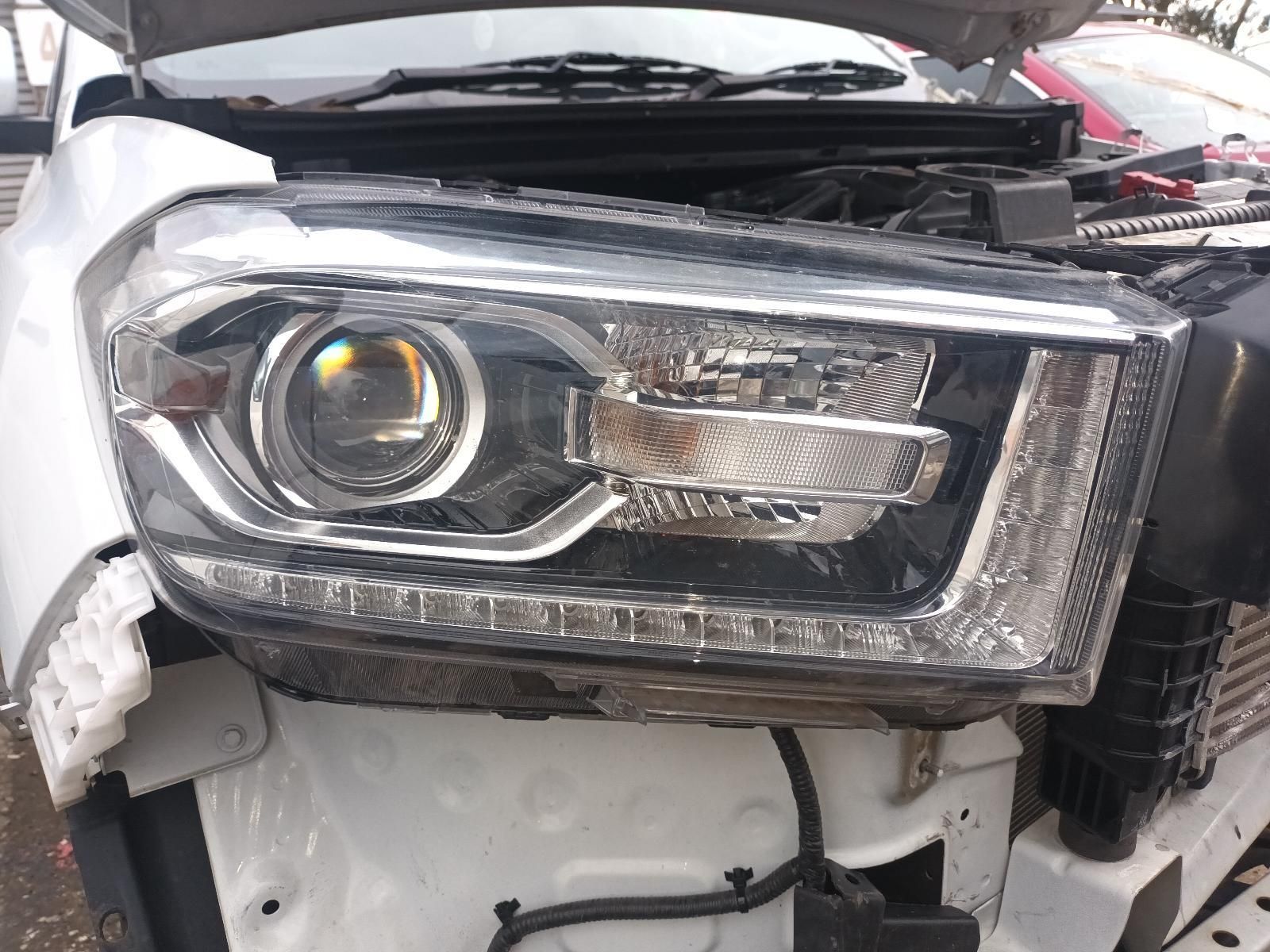 A Close Up of a Car Headlight with the Hood Open — South West 4WD Wreckers In Brisbane, QLD