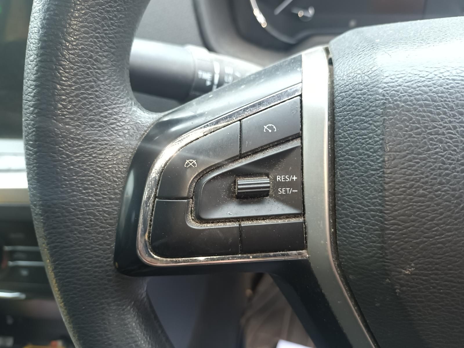 A Close Up of a Car Steering Wheel with a Remote Control — South West 4WD Wreckers In Brisbane, QLD