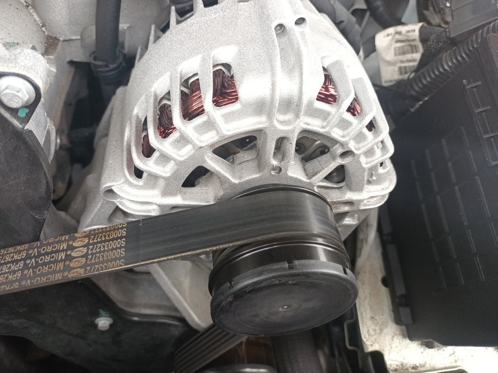 A Close Up of a Car Alternator with a Belt Attached to It — South West 4WD Wreckers In Brisbane, QLD