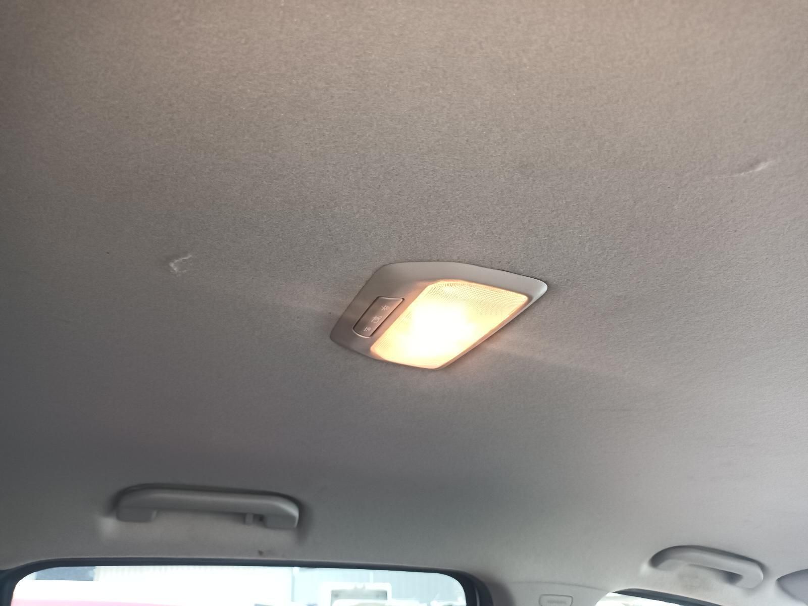 A Light is Hanging from the Ceiling of a Car — South West 4WD Wreckers In Brisbane, QLD