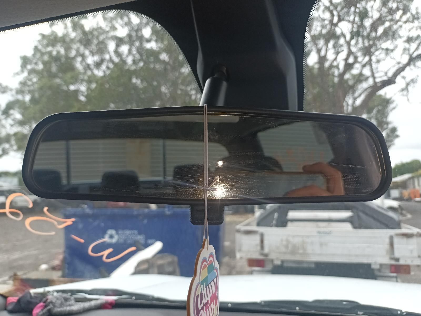 A Car Rear View Mirror with a Hanging Air Freshener — South West 4WD Wreckers In Brisbane, QLD