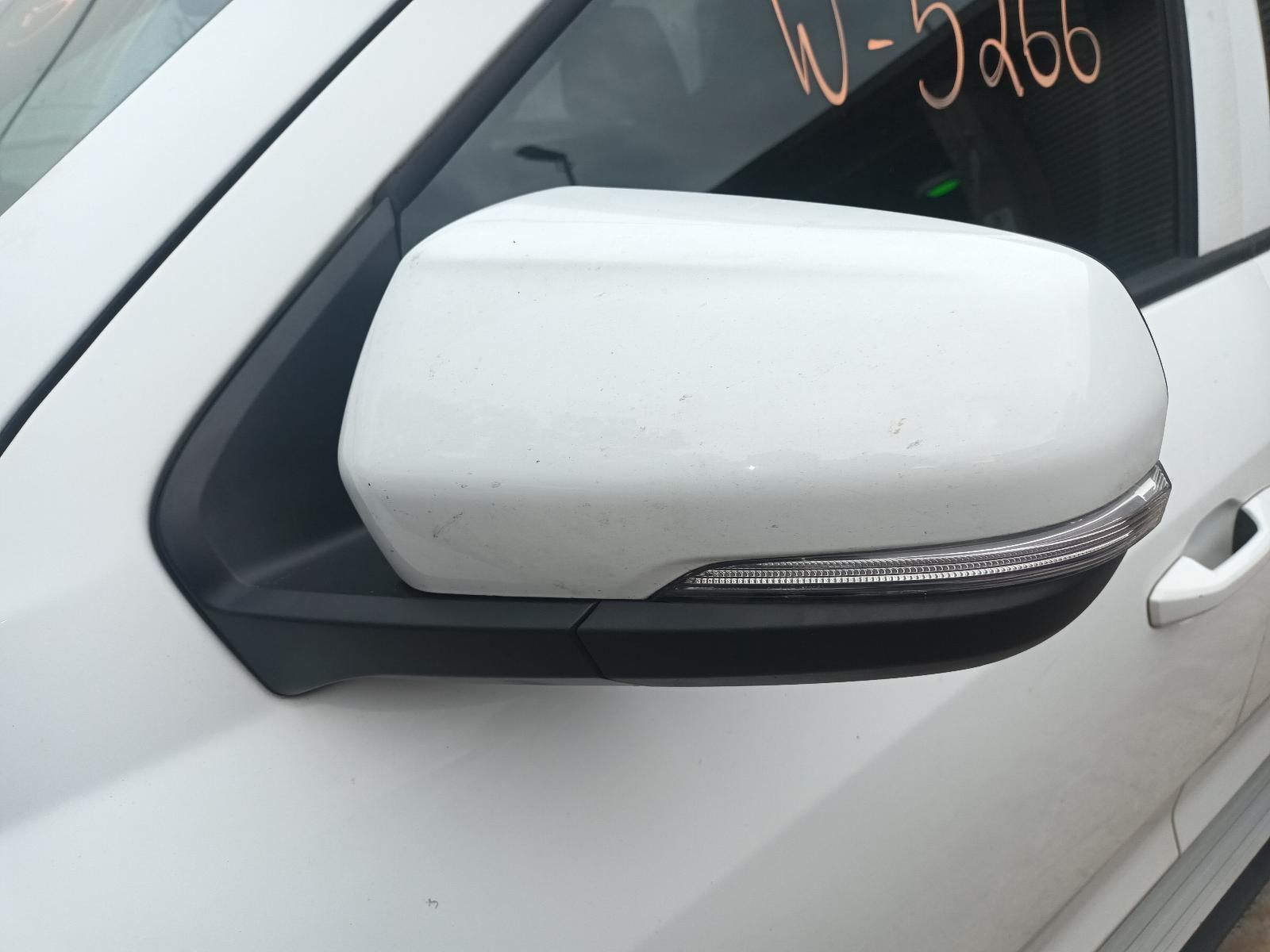 A Close Up of a Side View Mirror on a White Car — South West 4WD Wreckers In Brisbane, QLD