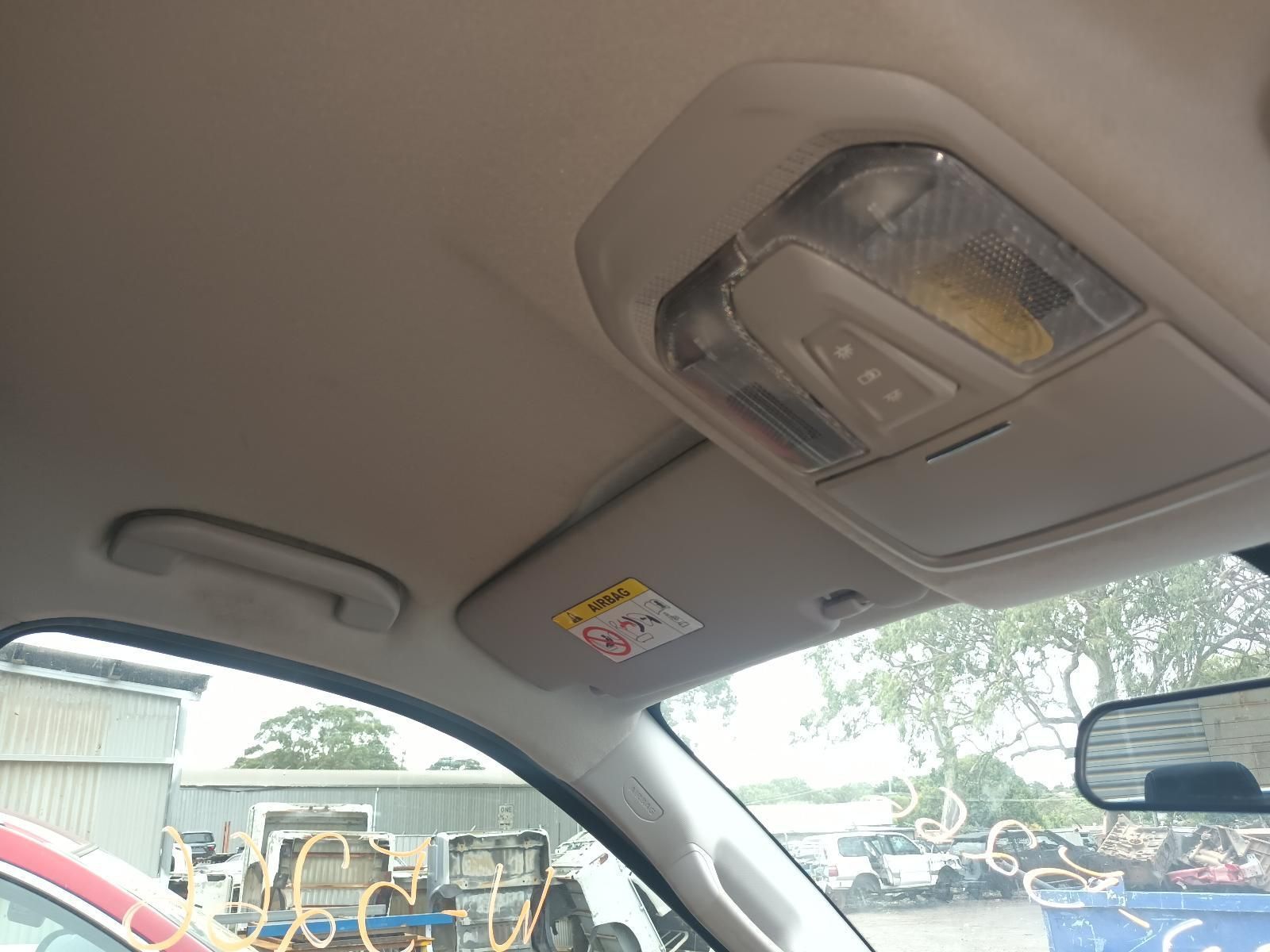 The Inside of a Car with a Sun Visor and a Rear View Mirror — South West 4WD Wreckers In Brisbane, QLD