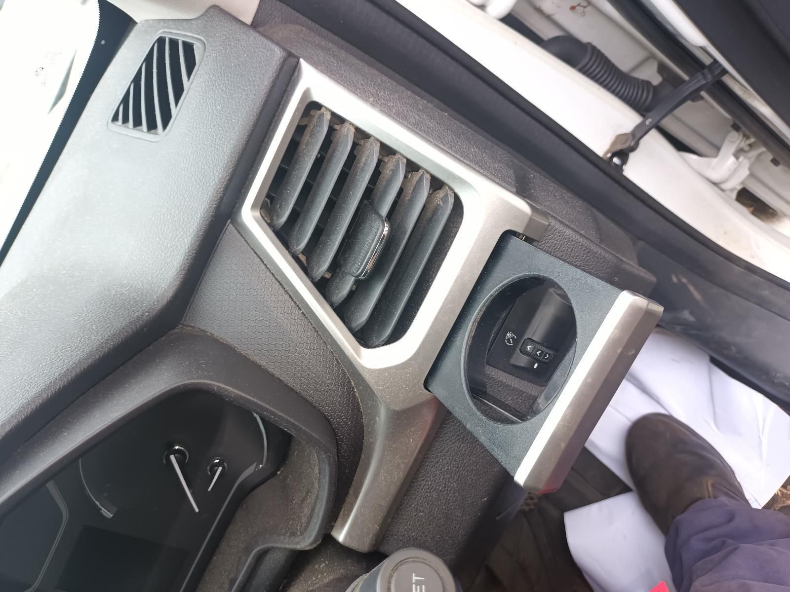 A Close Up of a Car Dashboard with a Cup Holder — South West 4WD Wreckers In Brisbane, QLD