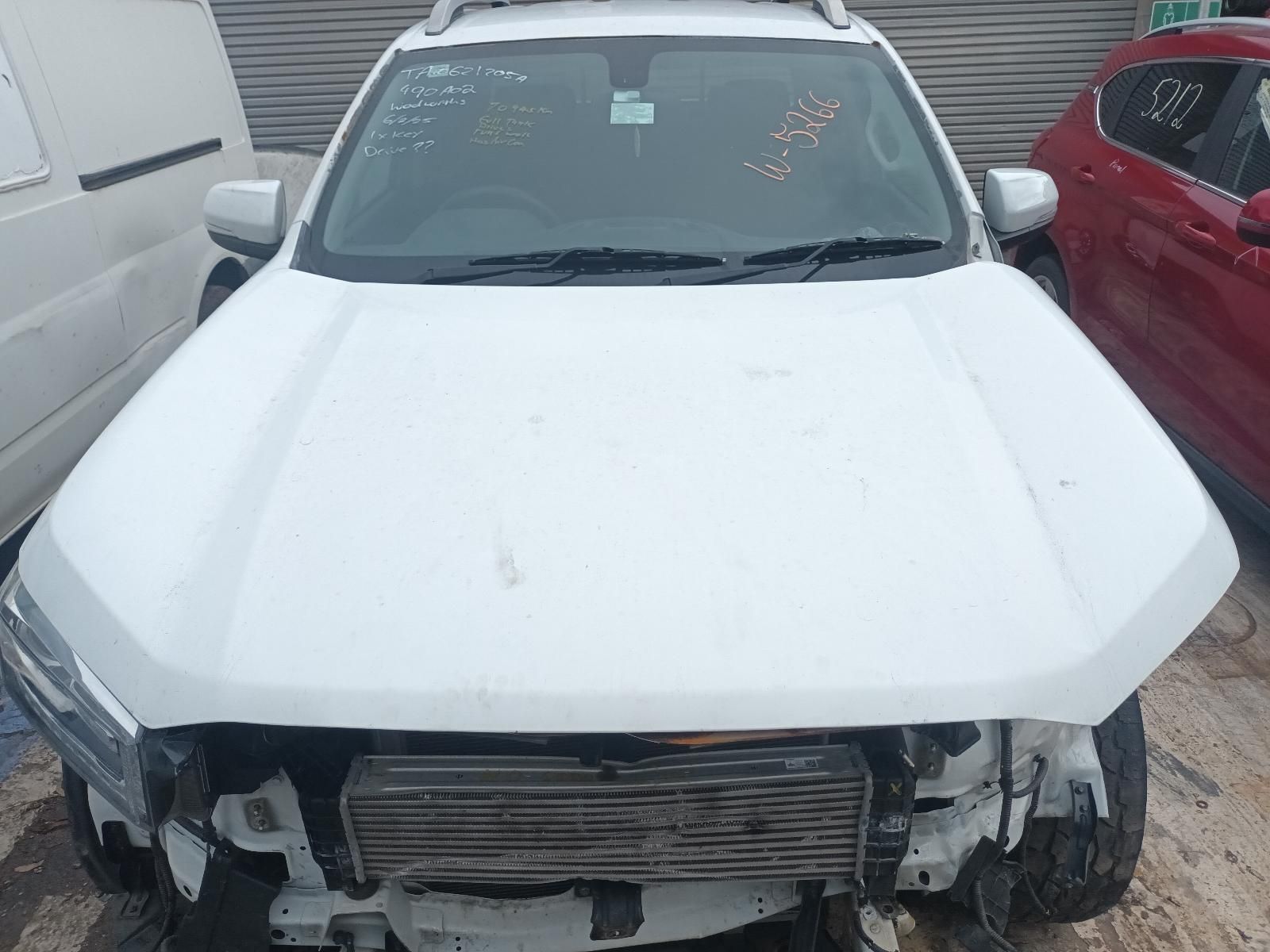 A White Car with a Broken Hood is Parked Next to a Red Car — South West 4WD Wreckers In Brisbane, QLD