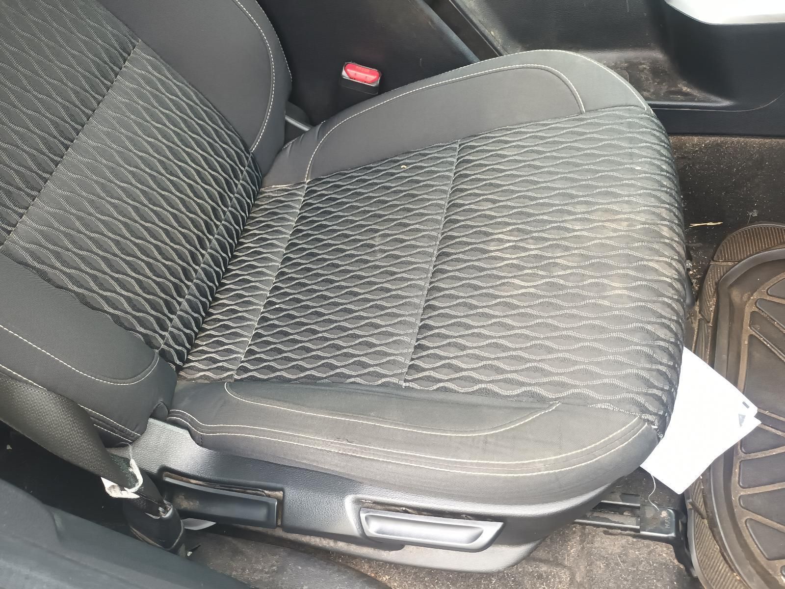 A Car Seat is Sitting in the Back Seat of a Car — South West 4WD Wreckers In Brisbane, QLD