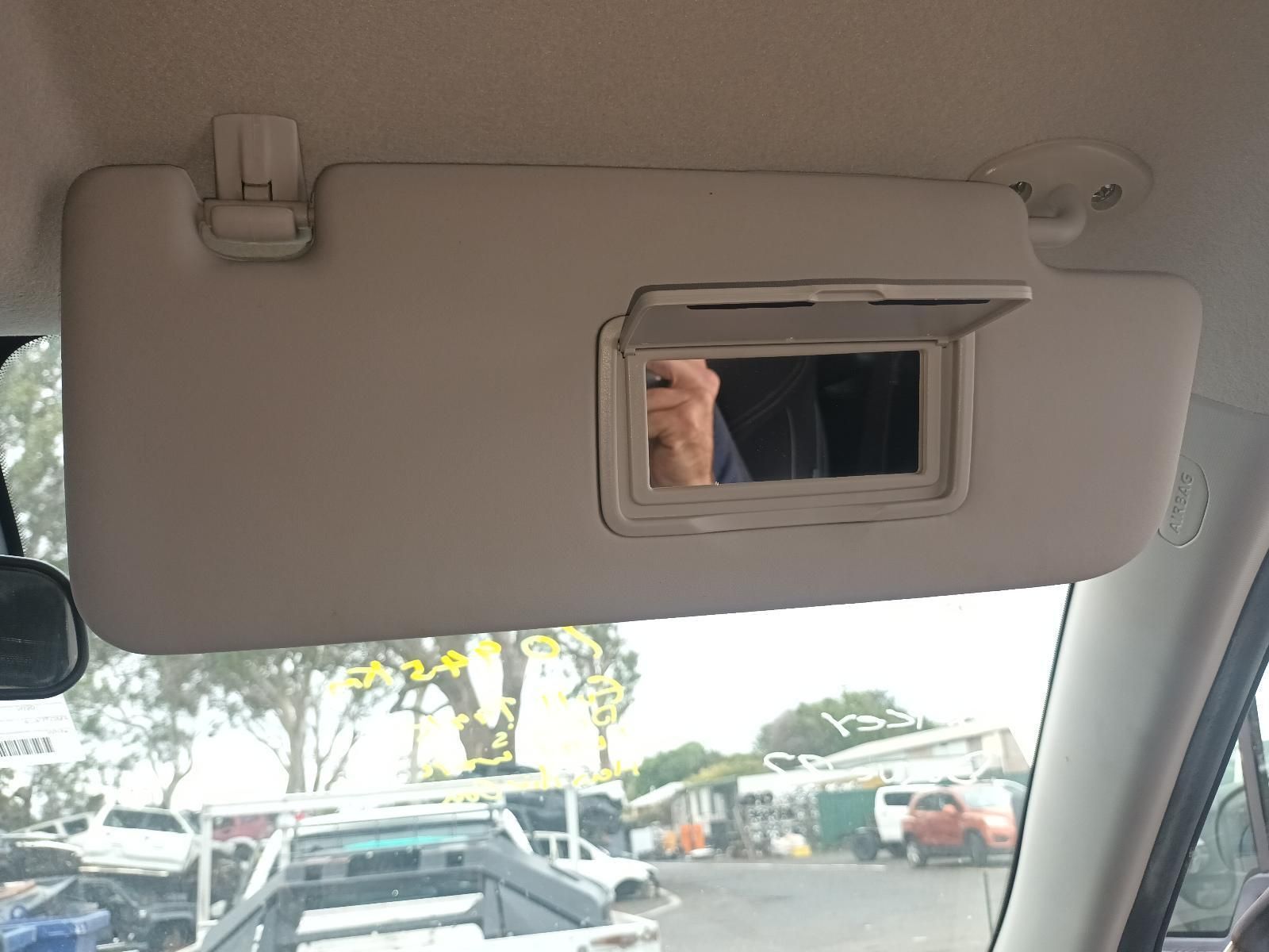 A Car Sun Visor with a Mirror Attached to It — South West 4WD Wreckers In Brisbane, QLD
