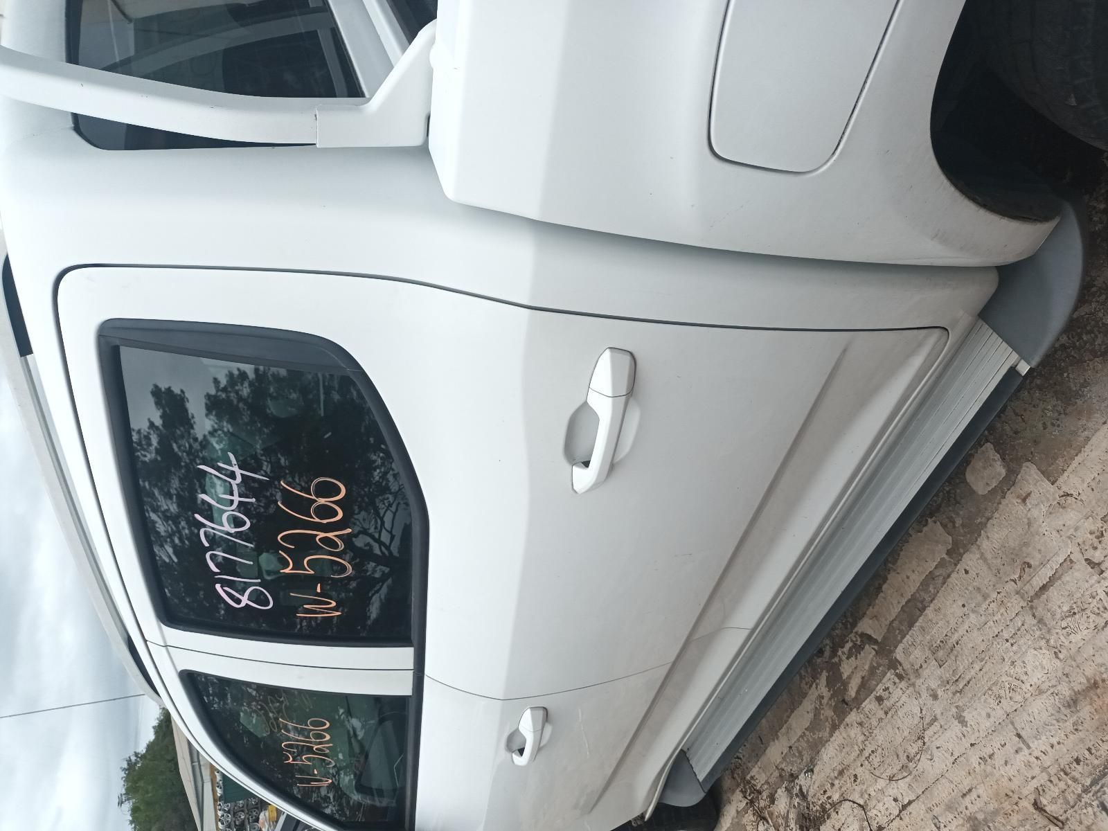 A White Truck is Parked on the Side of the Road — South West 4WD Wreckers In Brisbane, QLD