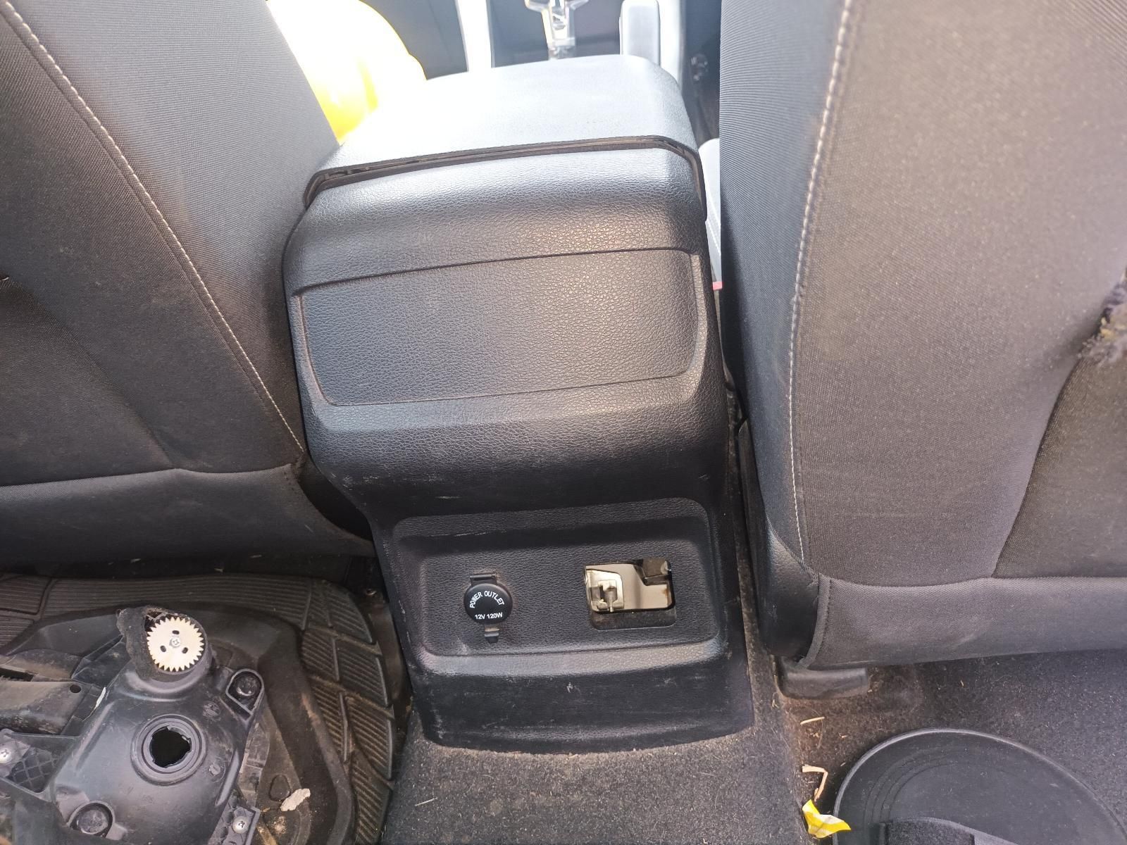 A Black Arm Rest in the Back Seat of a Car — South West 4WD Wreckers In Brisbane, QLD