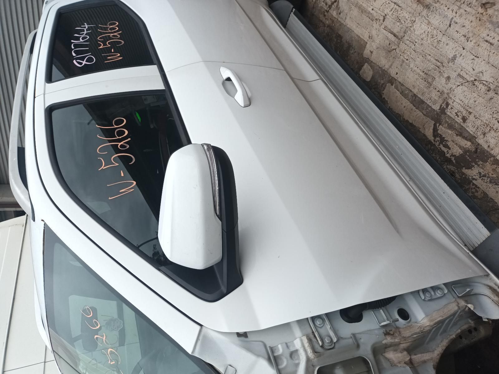 A White Car with a Broken Door — South West 4WD Wreckers In Brisbane, QLD