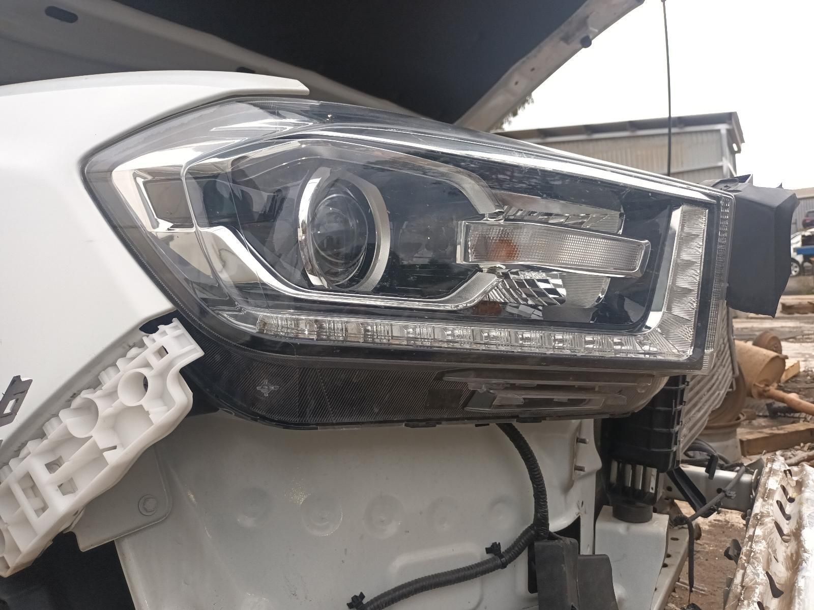 A Close Up of a Car Headlight with the Hood Open — South West 4WD Wreckers In Brisbane, QLD