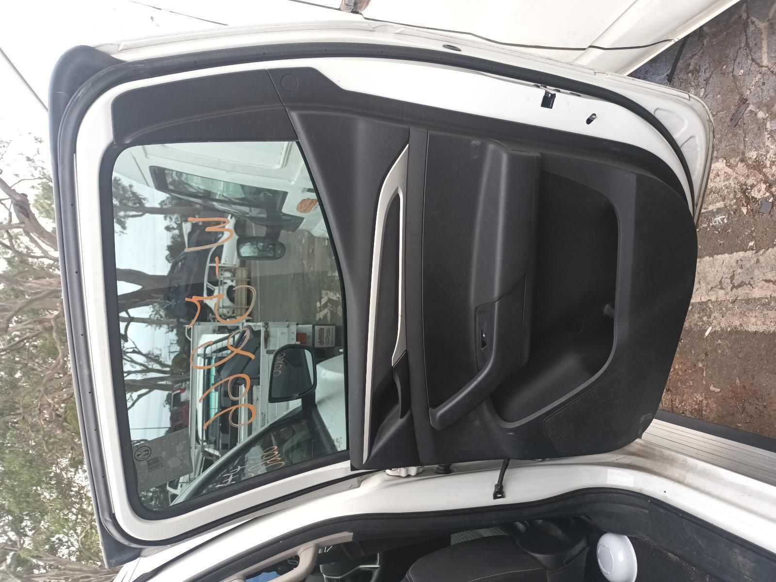 A White Car with the Door Open and the Trunk Open — South West 4WD Wreckers In Brisbane, QLD 