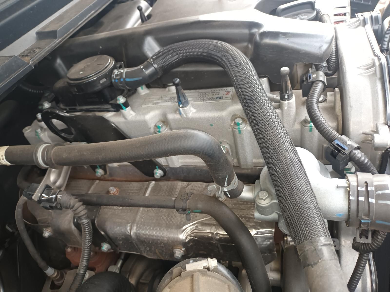 A Close Up of a Car Engine with Hose Attached to It — South West 4WD Wreckers In Brisbane, QLD