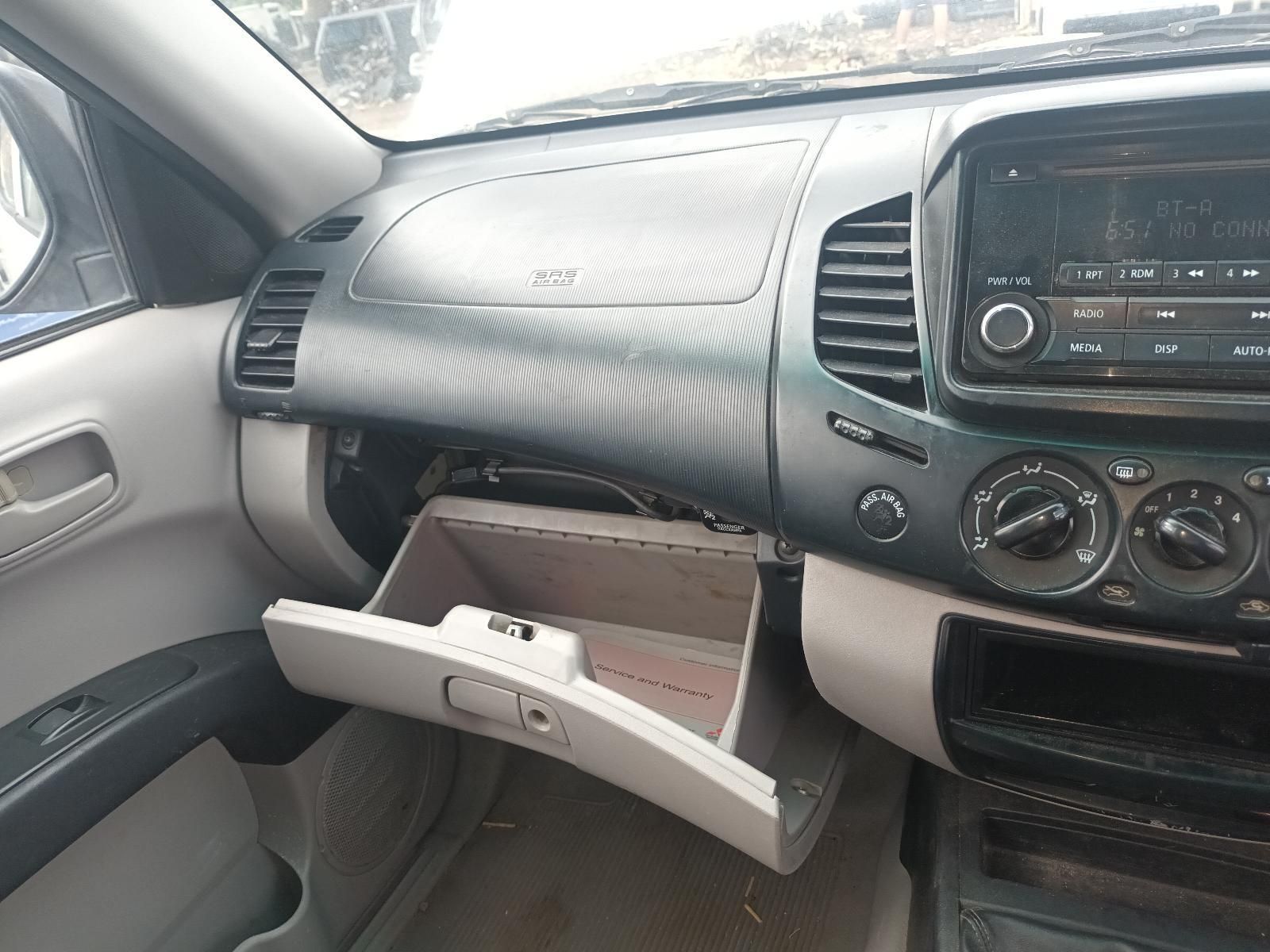 The Inside of a Car with the Glove Box Open — South West 4WD Wreckers In Brisbane, QLD