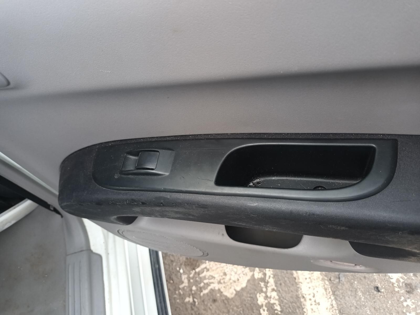 A Close Up of a Car Door Handle with a Button on It — South West 4WD Wreckers In Brisbane, QLD