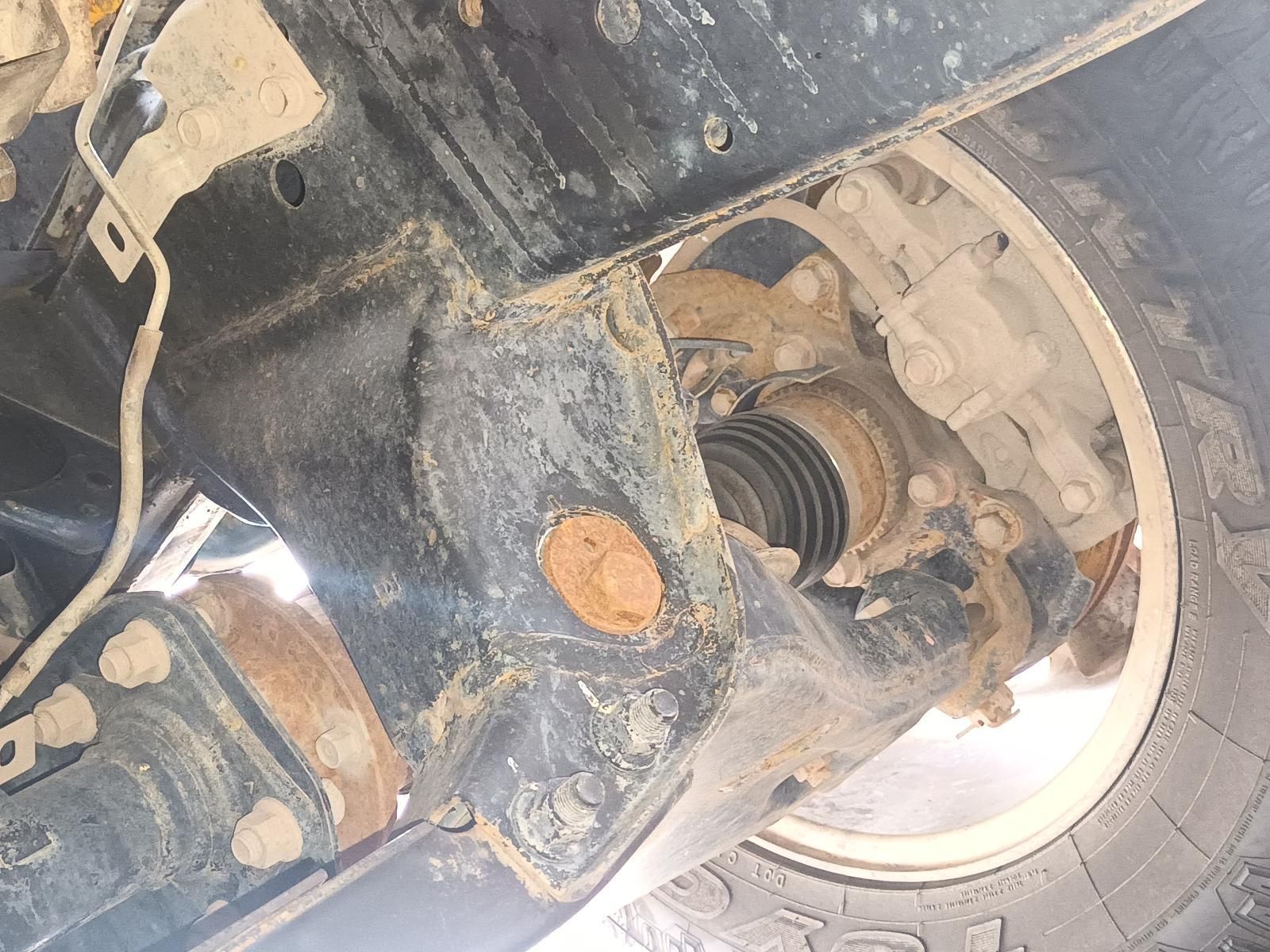 A Close Up of the Underside of a Car with a Tire — South West 4WD Wreckers In Brisbane, QLD