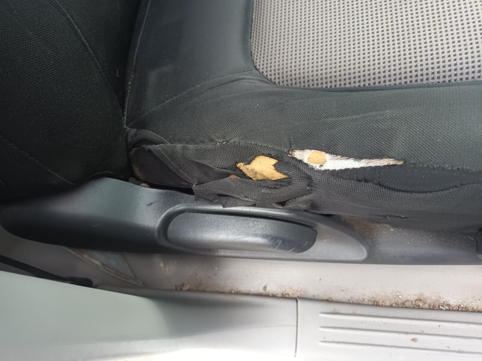 A Close Up of a Car Seat with a Hole in It — South West 4WD Wreckers In Brisbane, QLD