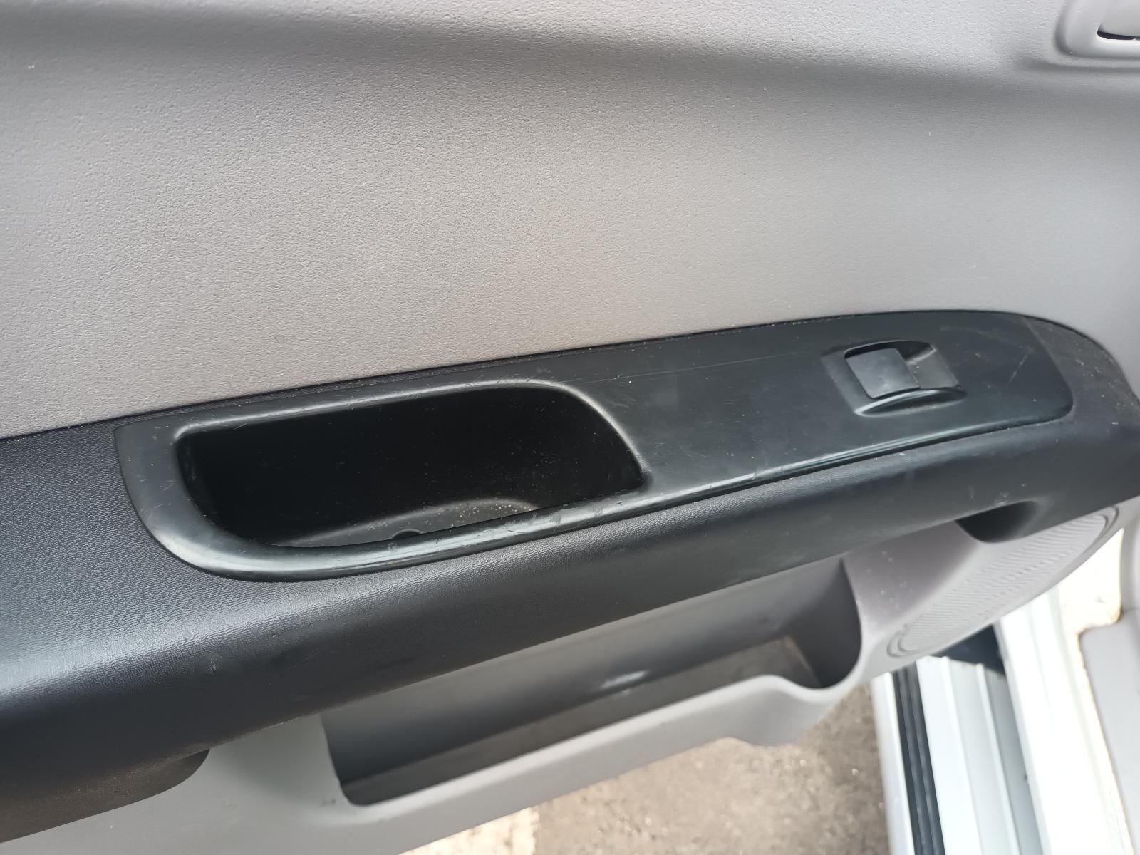 A Close Up of a Car Door Handle with a Button on It — South West 4WD Wreckers In Brisbane, QLD