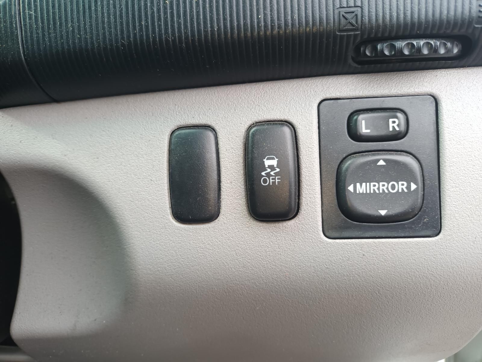 A Close Up of a Mirror Switch on a Car Dashboard — South West 4WD Wreckers In Brisbane, QLD