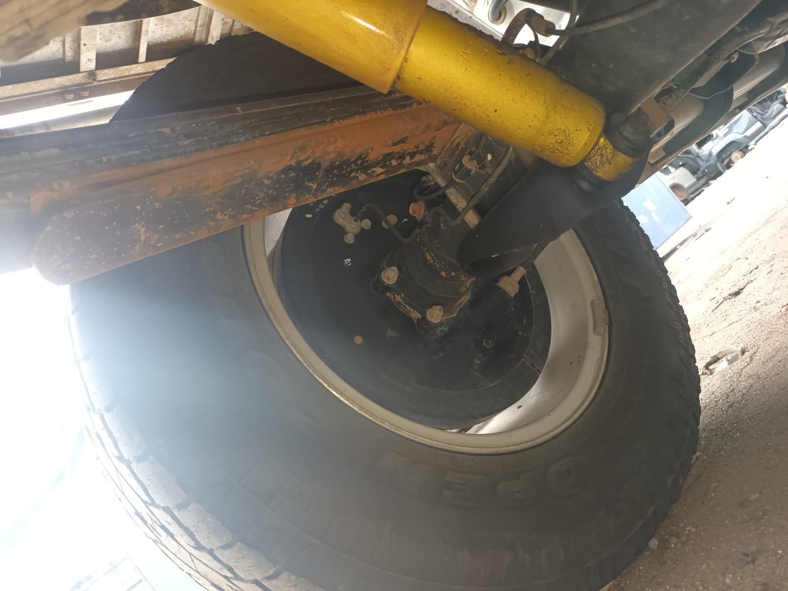 A Close Up of a Tire and Shock Absorber on a Truck — South West 4WD Wreckers In Brisbane, QLD