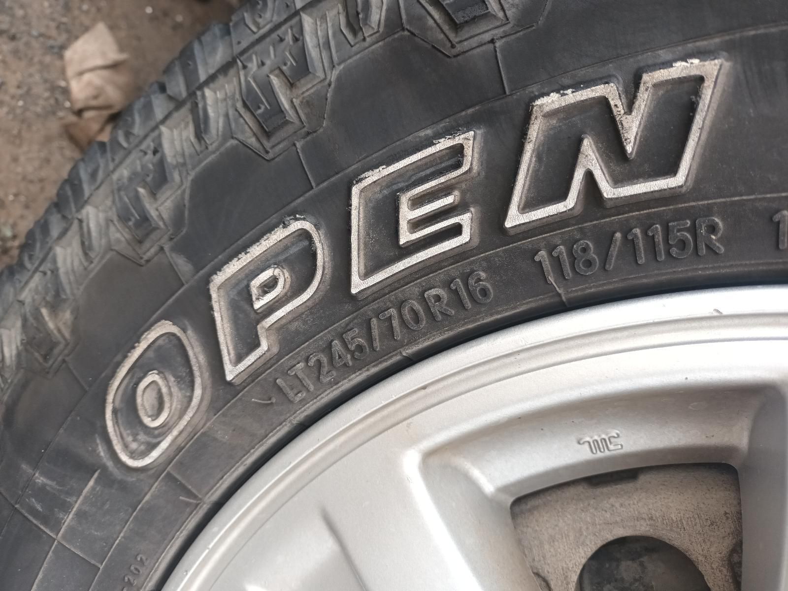 A Close Up of a Tire That Says Open on It — South West 4WD Wreckers In Brisbane, QLD