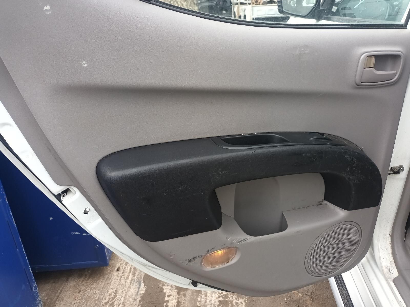 The Back Door of a White Car with the Door Open — South West 4WD Wreckers In Brisbane, QLD