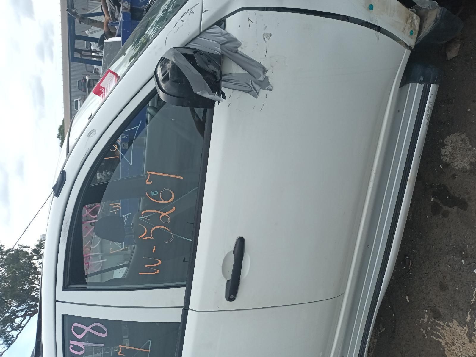 A White Truck is Sitting on the Side of the Road — South West 4WD Wreckers In Brisbane, QLD