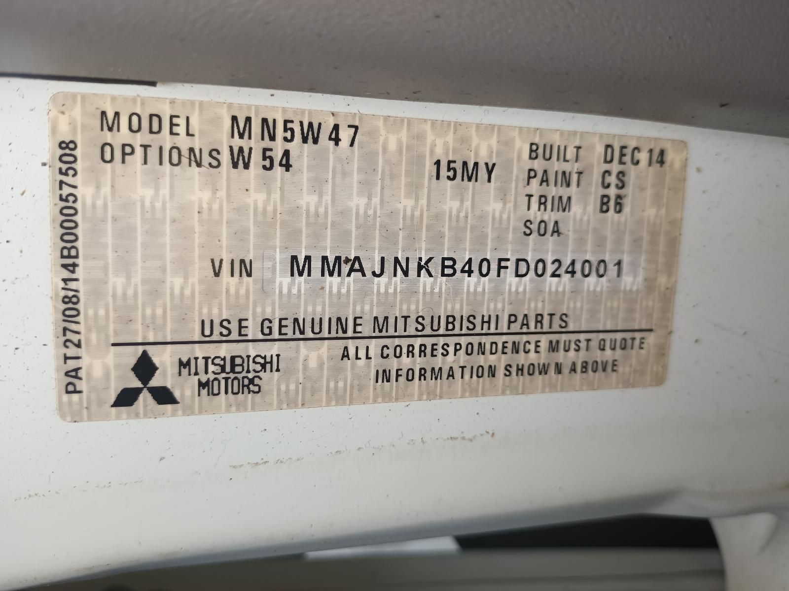 A Mitsubishi Motors Sticker on a White Vehicle — South West 4WD Wreckers In Brisbane, QLD
