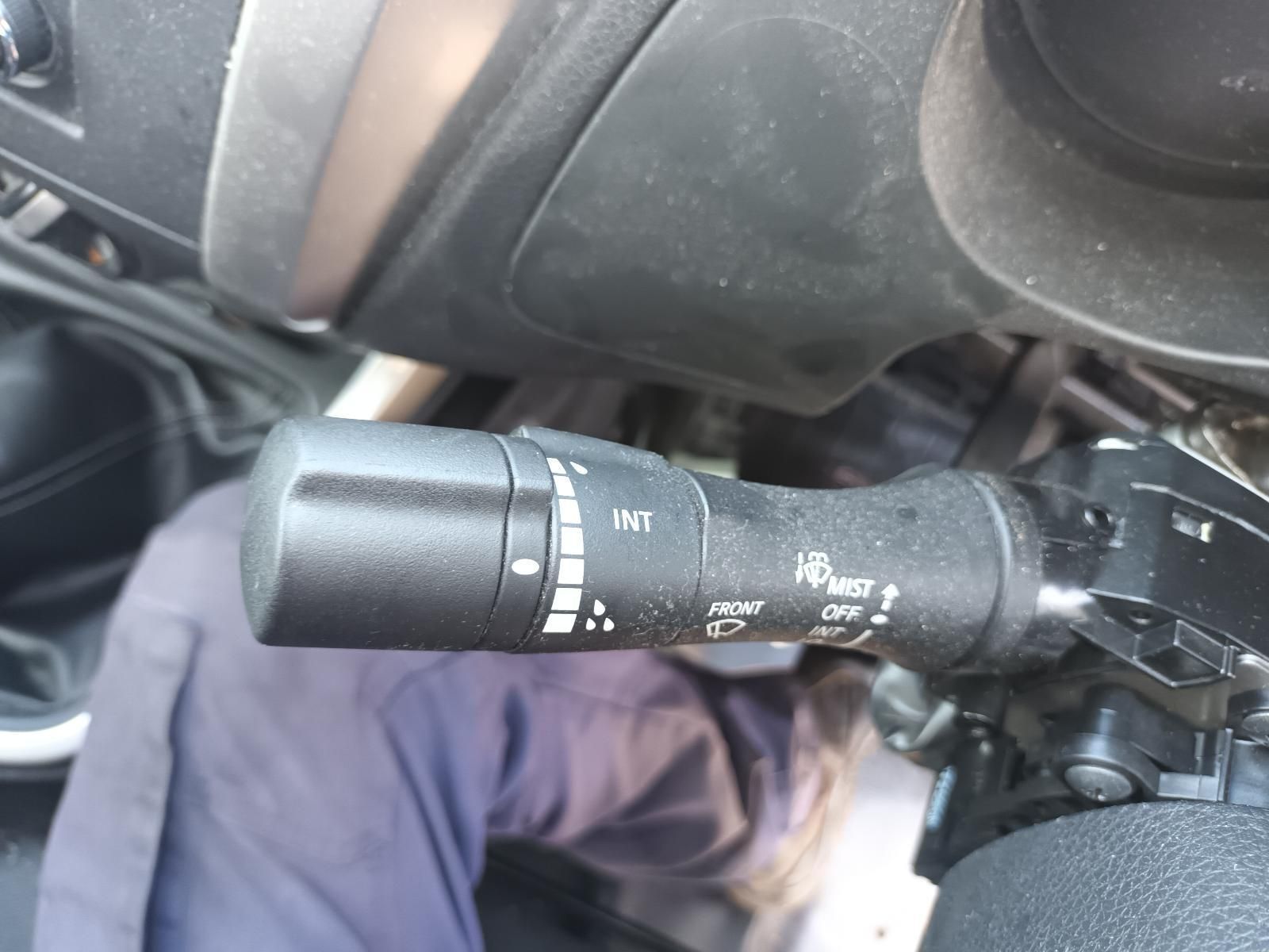 A Person is Sitting in a Car with a Light Switch on the Steering Wheel — South West 4WD Wreckers In Brisbane, QLD