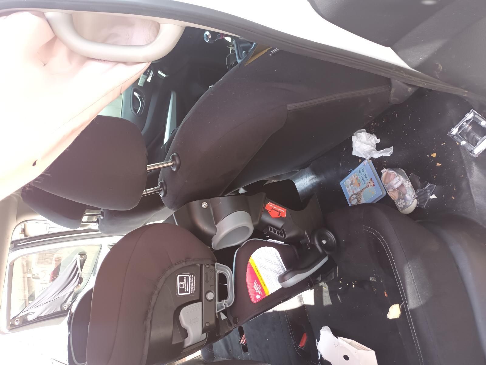 A Car Seat is Sitting in the Back Seat of a Car — South West 4WD Wreckers In Brisbane, QLD