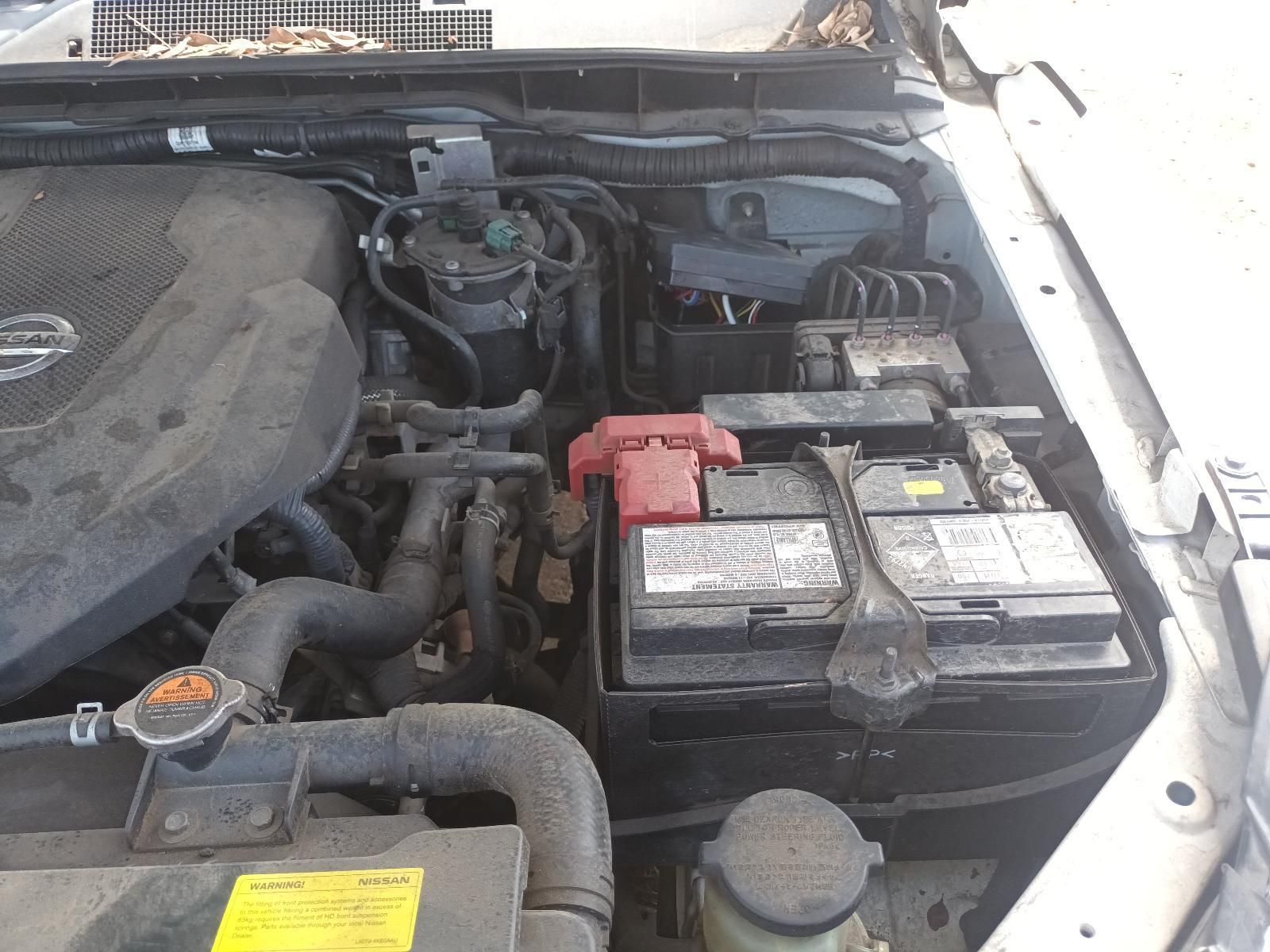 The Hood of a Car with a Battery in It — South West 4WD Wreckers In Brisbane, QLD