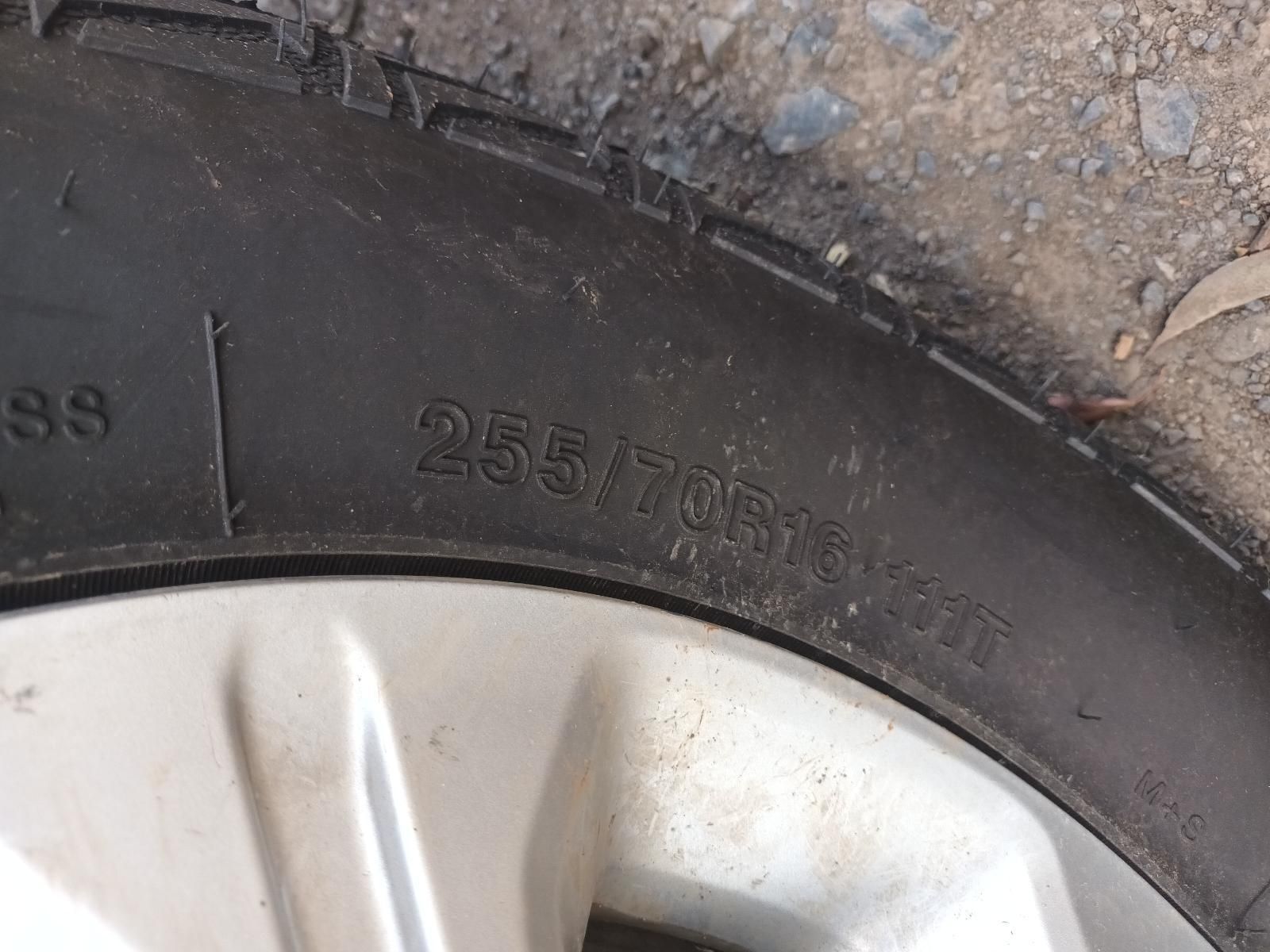 A Close Up of a Tire on a Wheel on the Ground — South West 4WD Wreckers In Brisbane, QLD