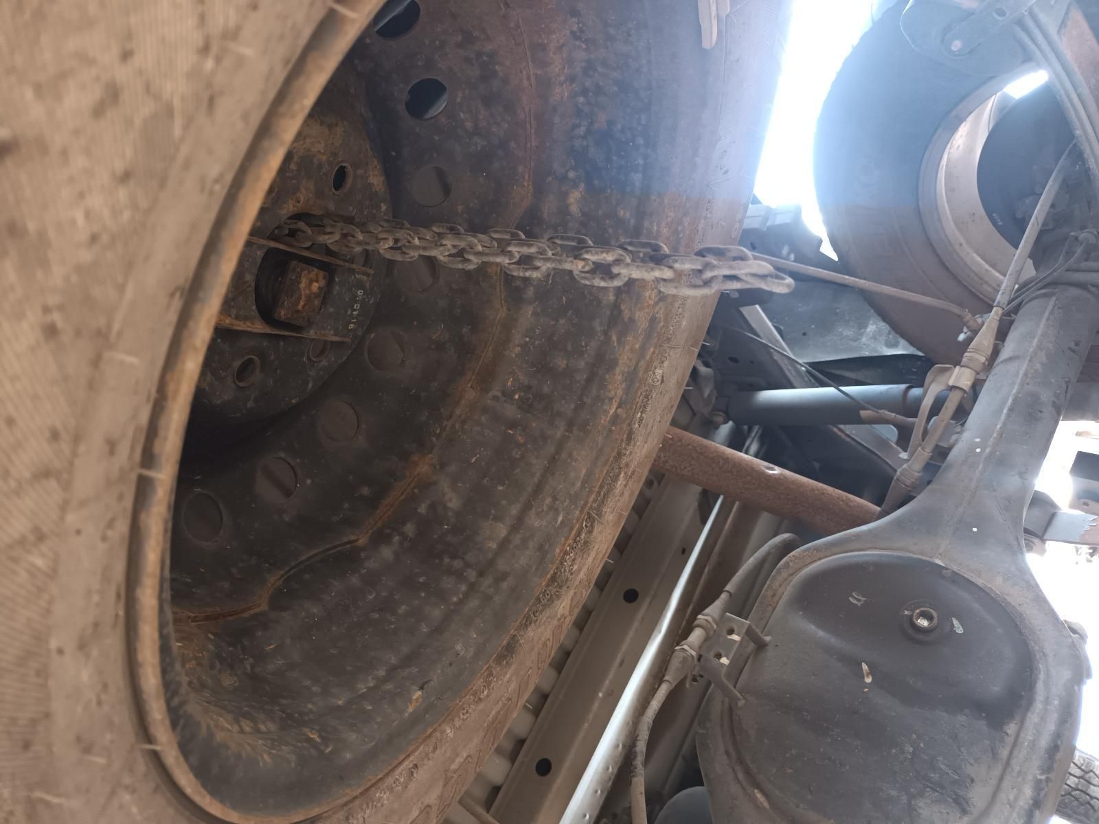 A Close Up of a Tire with a Chain Attached to It — South West 4WD Wreckers In Brisbane, QLD