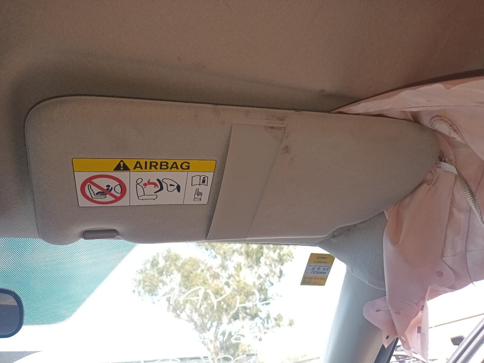 A Sun Visor with a Warning Sign on It That Says Airbag — South West 4WD Wreckers In Brisbane, QLD