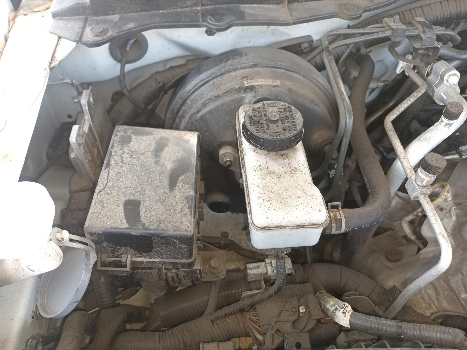 A Close Up of a Car Engine with a Brake Fluid Reservoir — South West 4WD Wreckers In Brisbane, QLD