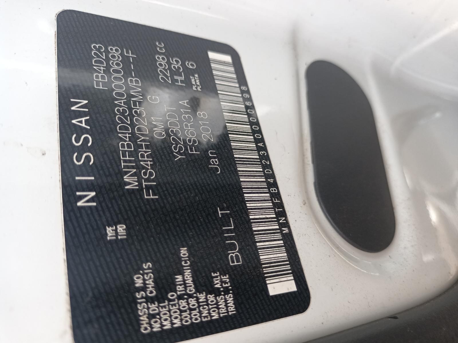 A Close Up of a Nissan Sticker on a White Car — South West 4WD Wreckers In Brisbane, QLD