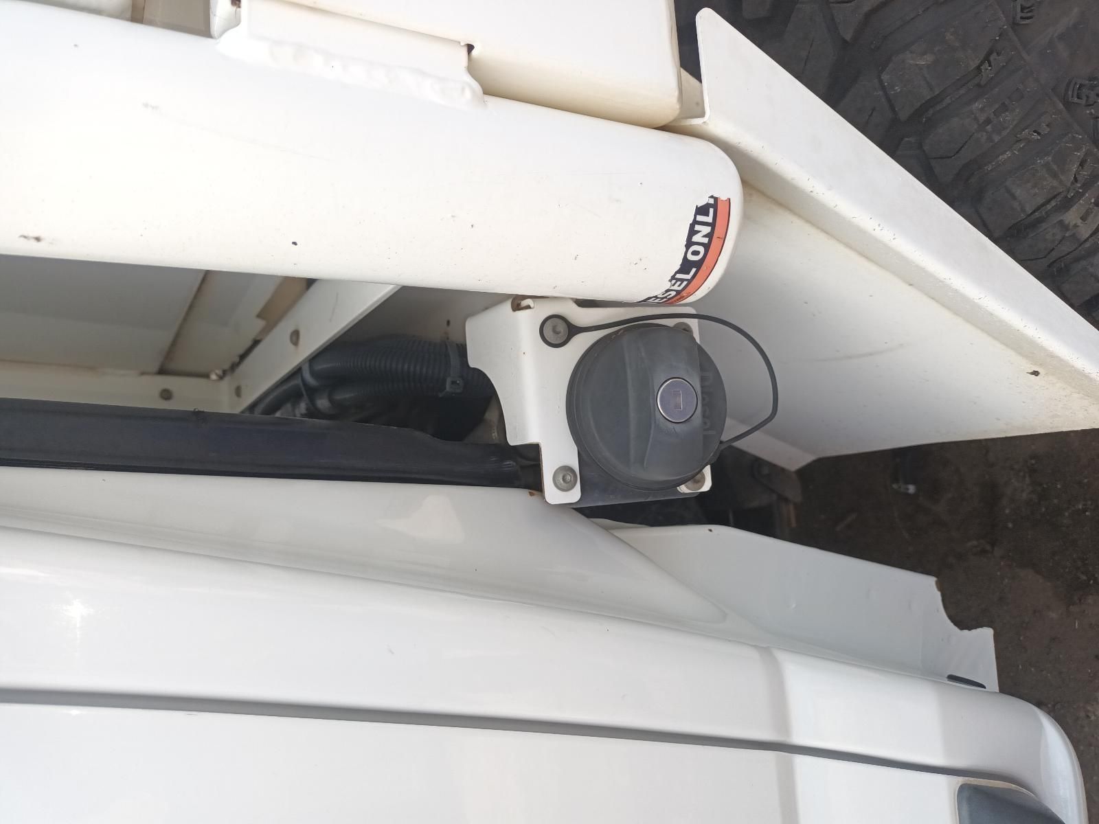 A White Car with a Toyota Sticker on the Side — South West 4WD Wreckers In Brisbane, QLD