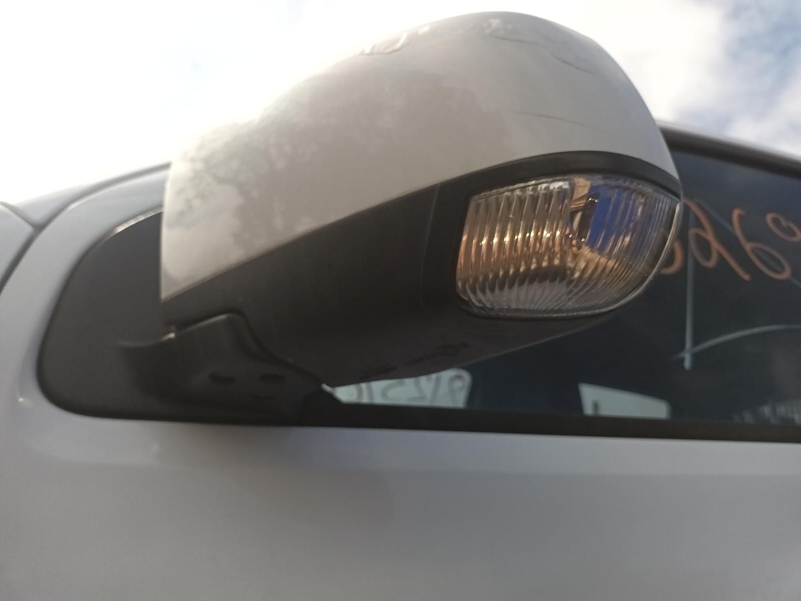 A Close Up of a Side View Mirror on a White Car — South West 4WD Wreckers In Brisbane, QLD