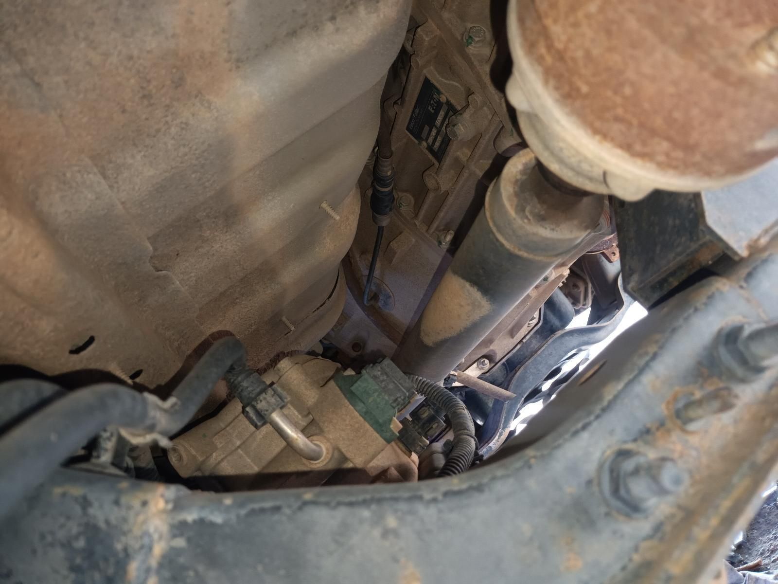 A Close Up of the Underside of a Car Showing the Exhaust Pipe — South West 4WD Wreckers In Brisbane, QLD