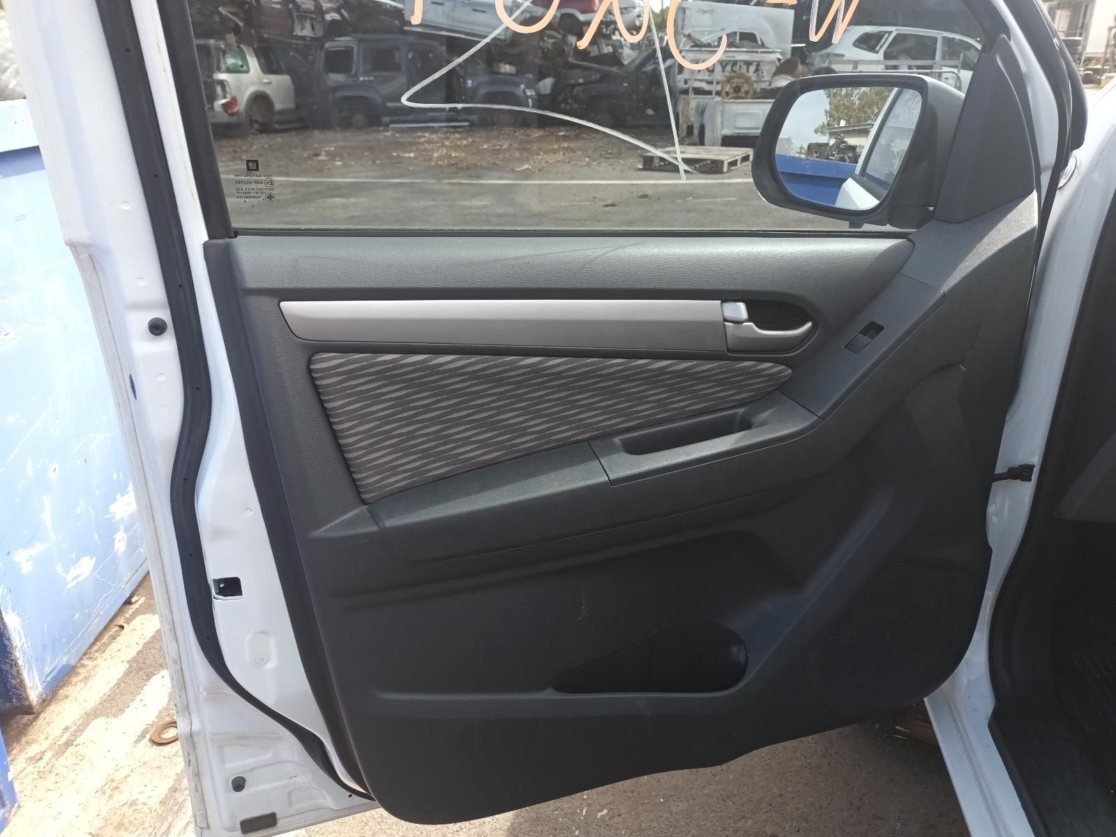 A White Car with the Door Open and a Rear View Mirror — South West 4WD Wreckers In Brisbane, QLD
