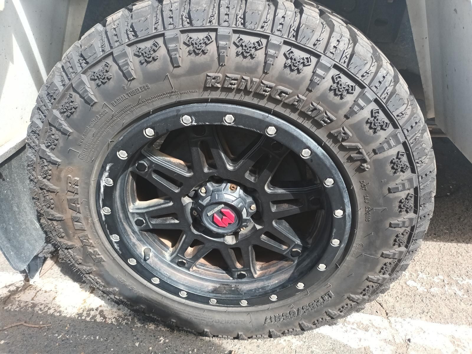 A Black Tire with Renegade Written on It — South West 4WD Wreckers In Brisbane, QLD