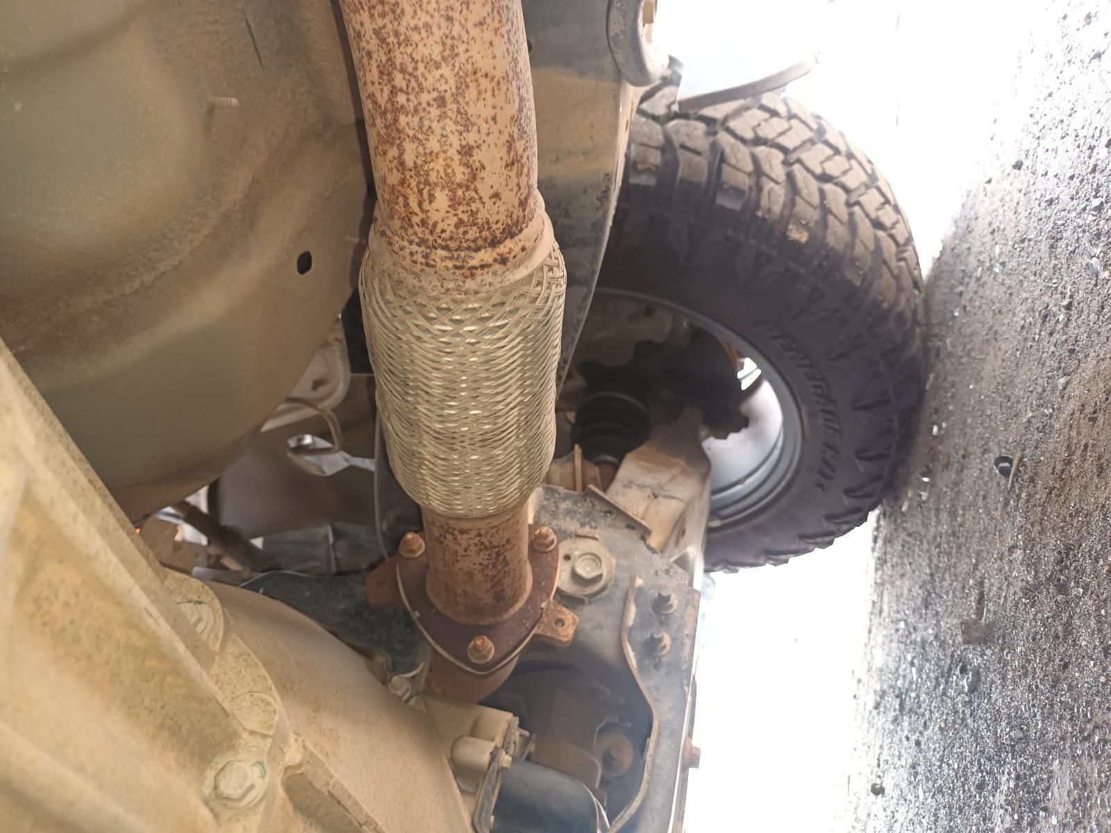 A Close Up of a Rusty Exhaust Pipe on a Car — South West 4WD Wreckers In Brisbane, QLD
