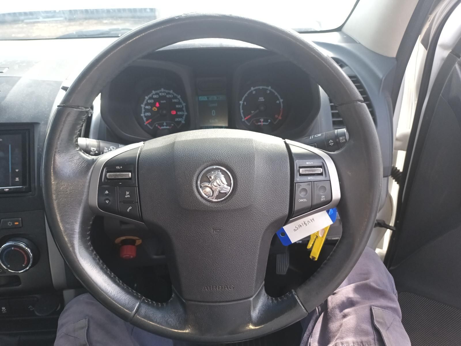 A Person is Sitting in the Driver's Seat of a Vauxhall Car — South West 4WD Wreckers In Brisbane, QLD 